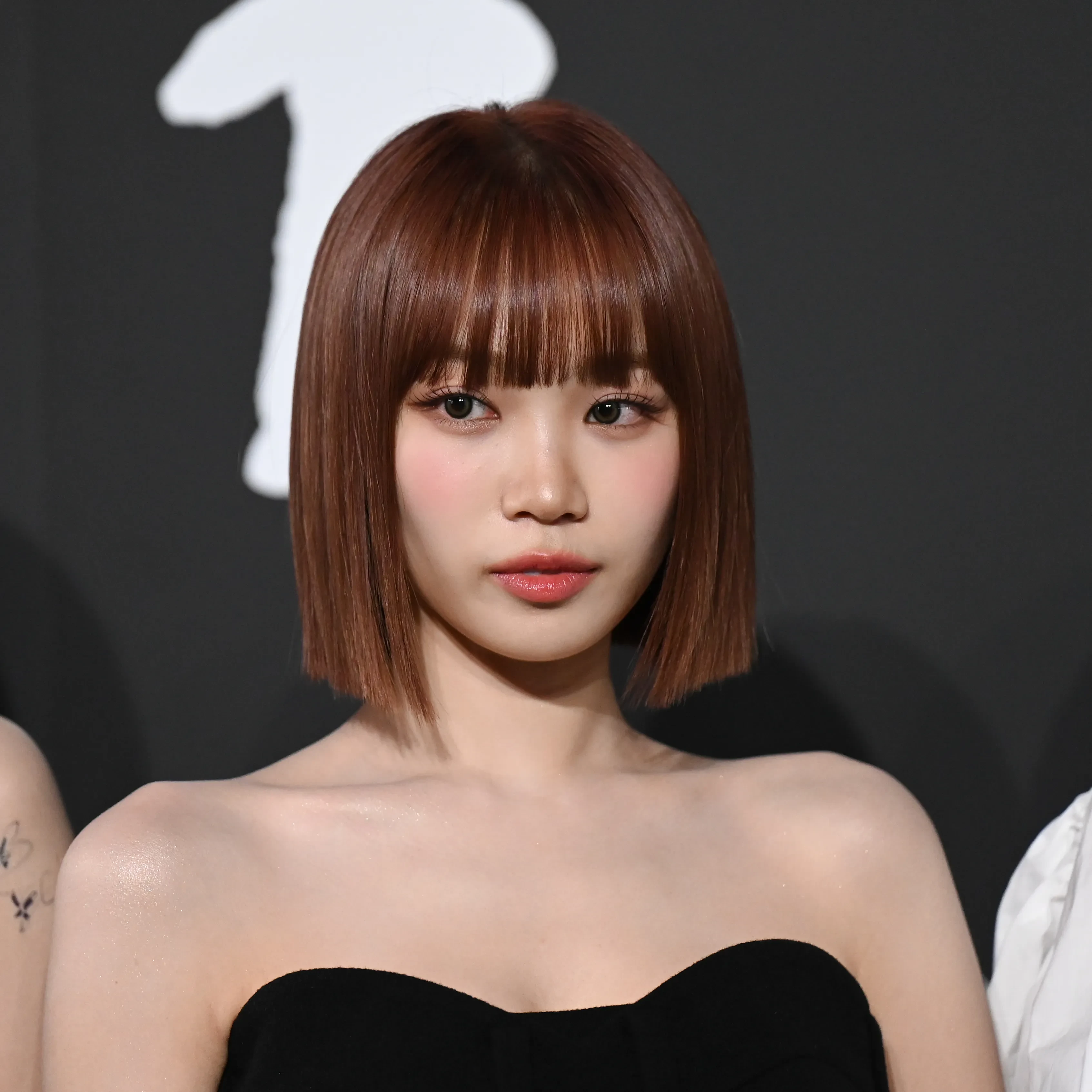 Editorial gallery of Chaewon (LE SSERAFIM) styled in cool winter outfits featuring sapphire, amethyst, and inky neutrals, highlighting glacier blue, raspberry, graphite, arctic white, and ultra black.