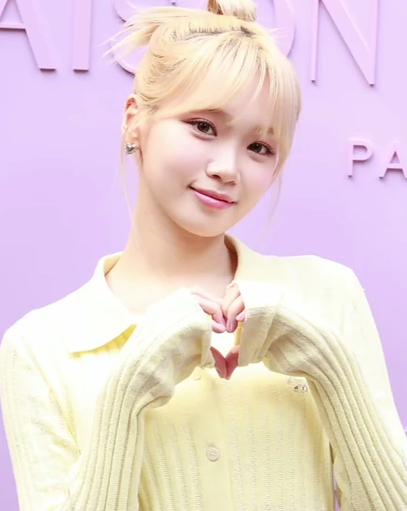Kim Chaewon (LE SSERAFIM) wearing sunshine pastel outfits with fluid fabric and glow, showcasing sherbet orange, mint, butter yellow, sky blue, and rose coral from the Light Spring palette.