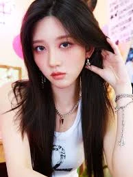 Gaeul (IVE) wearing cool jewel-toned gowns with sharp contrast, showcasing glacier blue, raspberry, graphite, arctic white, and ultra black from the Cool Winter palette.