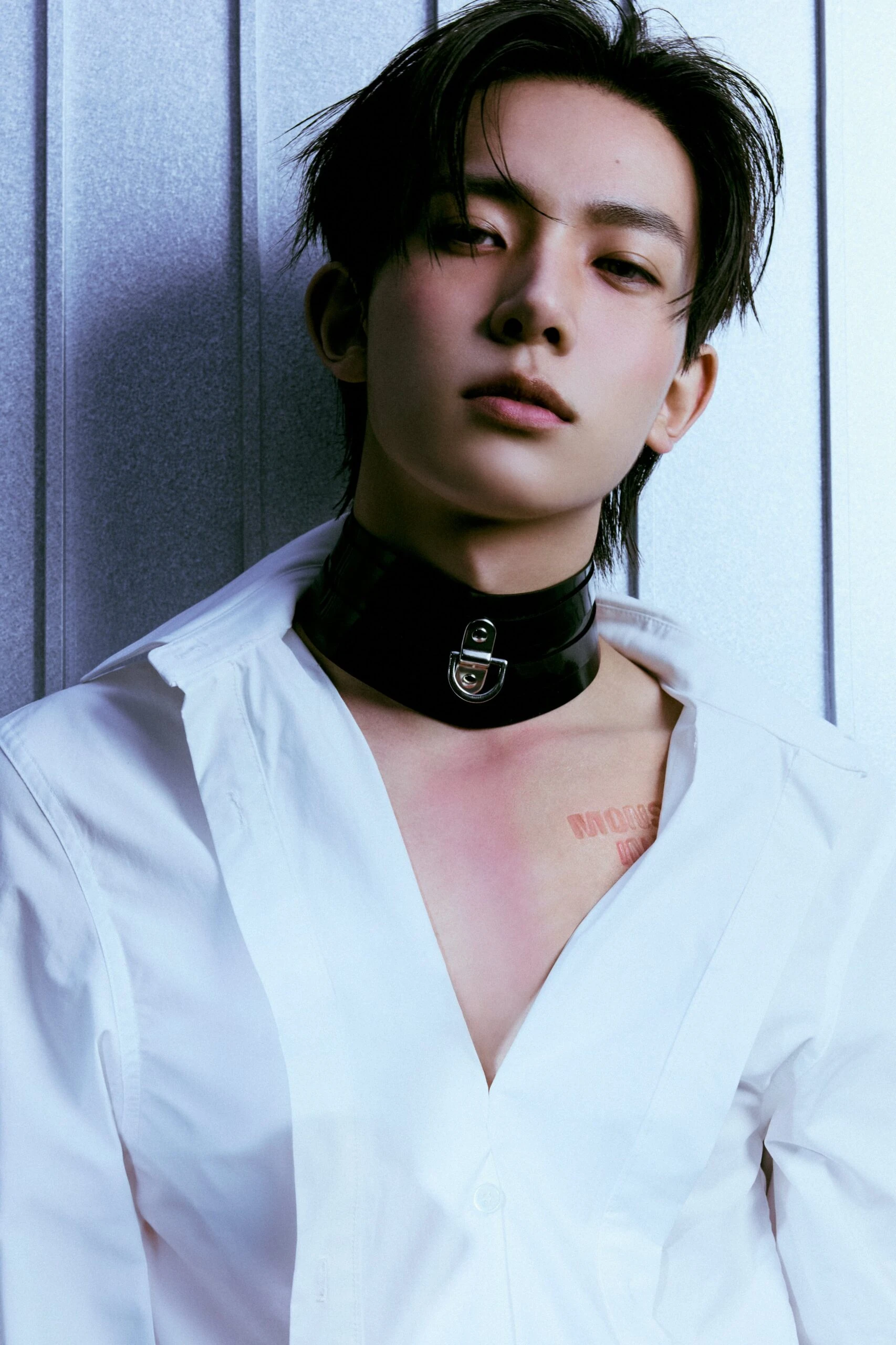 Heeseung (ENHYPEN) wearing balanced jewel-toned looks with cool neutrals, showcasing steel blue, cranberry, optic white, graphite, and imperial purple from the Neutral Winter palette.