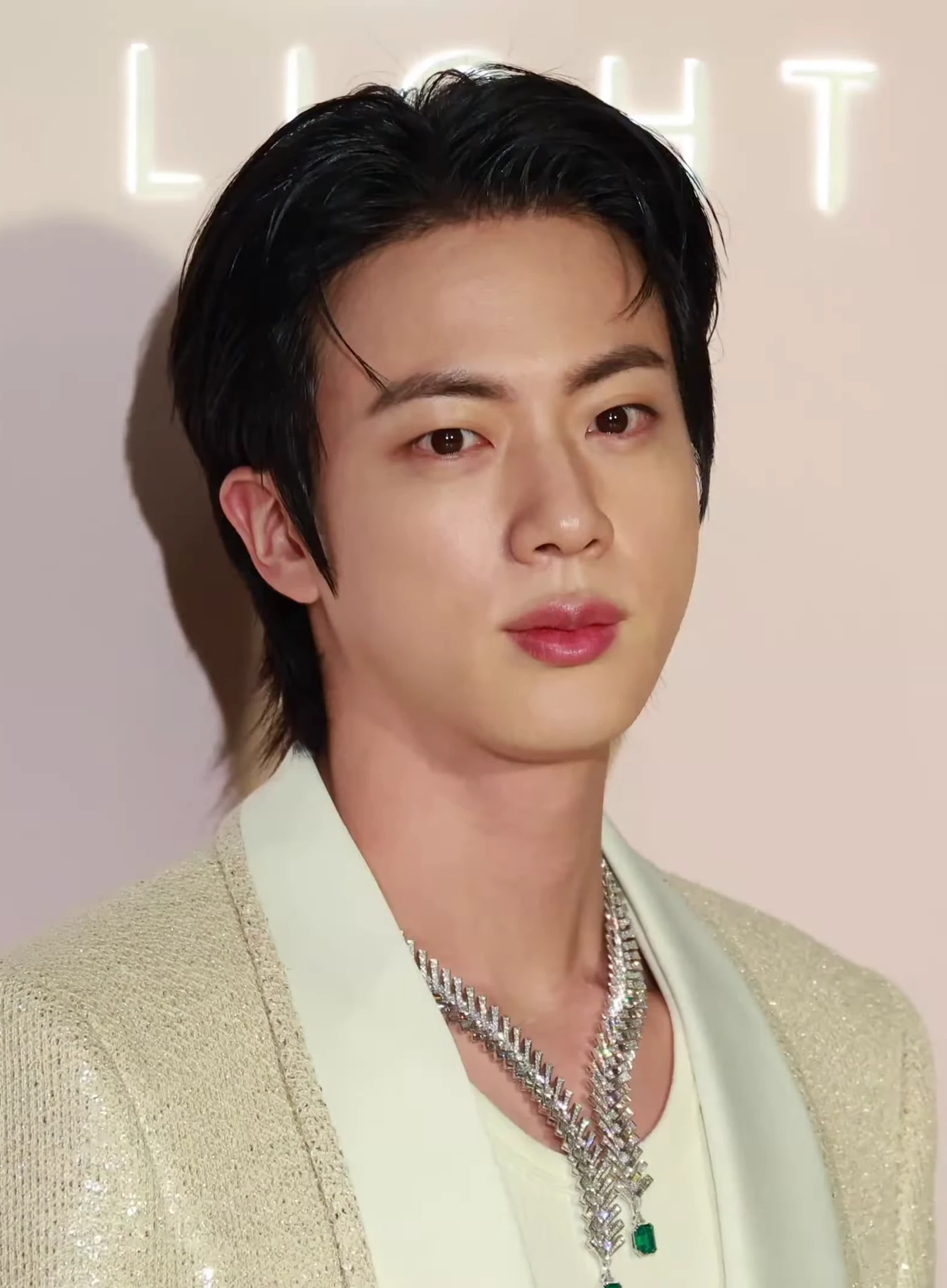 Jin (BTS) wearing balanced jewel-toned looks with cool neutrals, showcasing steel blue, cranberry, optic white, graphite, and imperial purple from the Neutral Winter palette.