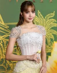 Editorial gallery of Lisa (BLACKPINK) styled in bright winter looks with electric blues, magenta accents, and polished black, highlighting neon fuchsia, electric blue, optic white, chrome, and jet black.