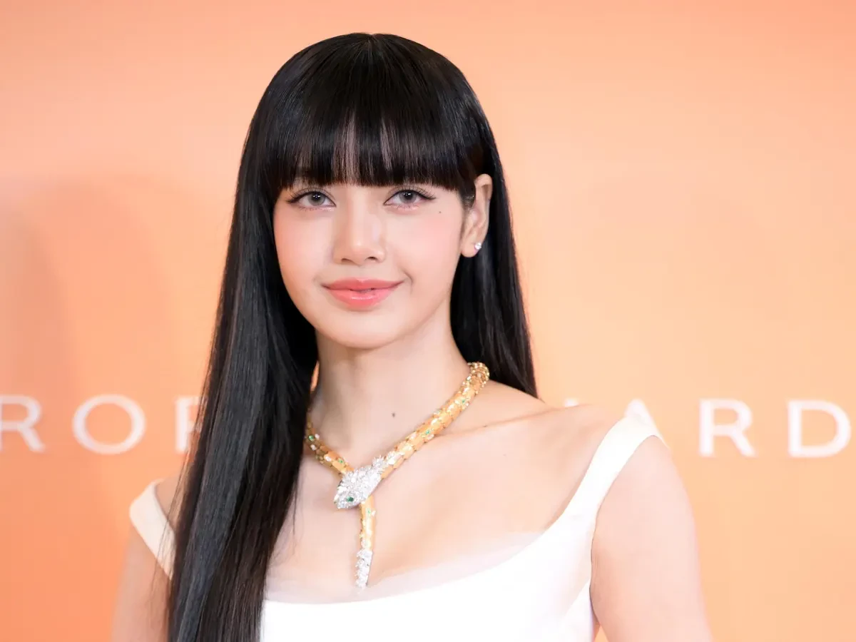 Editorial gallery of LiSA styled in neutral winter outfits highlighting sapphire, burgundy, and smoked grays, highlighting steel blue, cranberry, optic white, graphite, and imperial purple.