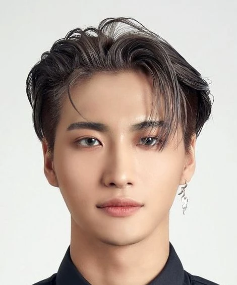 Editorial gallery of Seonghwa (ATEEZ) styled in vibrant autumn outfits featuring saffron, teal, and gold hardware, highlighting burnt sienna, chartreuse, emerald, molten gold, and espresso.