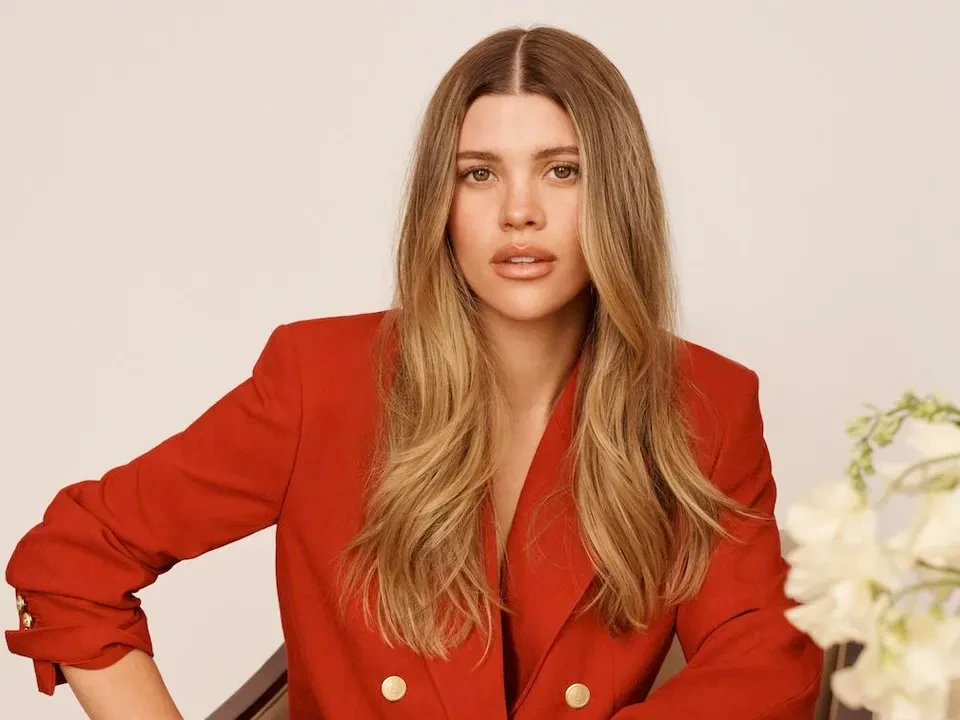 Editorial gallery of Sofia Richie Grainge styled in soft summer outfits blending dusty mauve, mist blue, and slate neutrals, highlighting mist blue, stone, pale mauve, soft navy, and oyster.