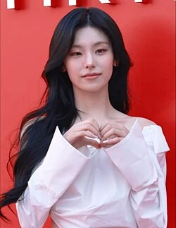 Yeji (ITZY) wearing cool-toned looks with berry accents and fluid movement, showcasing powder blue, soft lilac, rose quartz, silvery sage, and midnight plum from the True Summer palette.