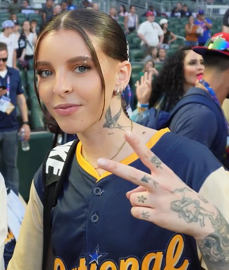 Young Miko wearing icy pastel tailoring with soft shimmer, showcasing bluebell, lavender mist, storm gray, cool teal, and soft navy from the Cool Summer palette.